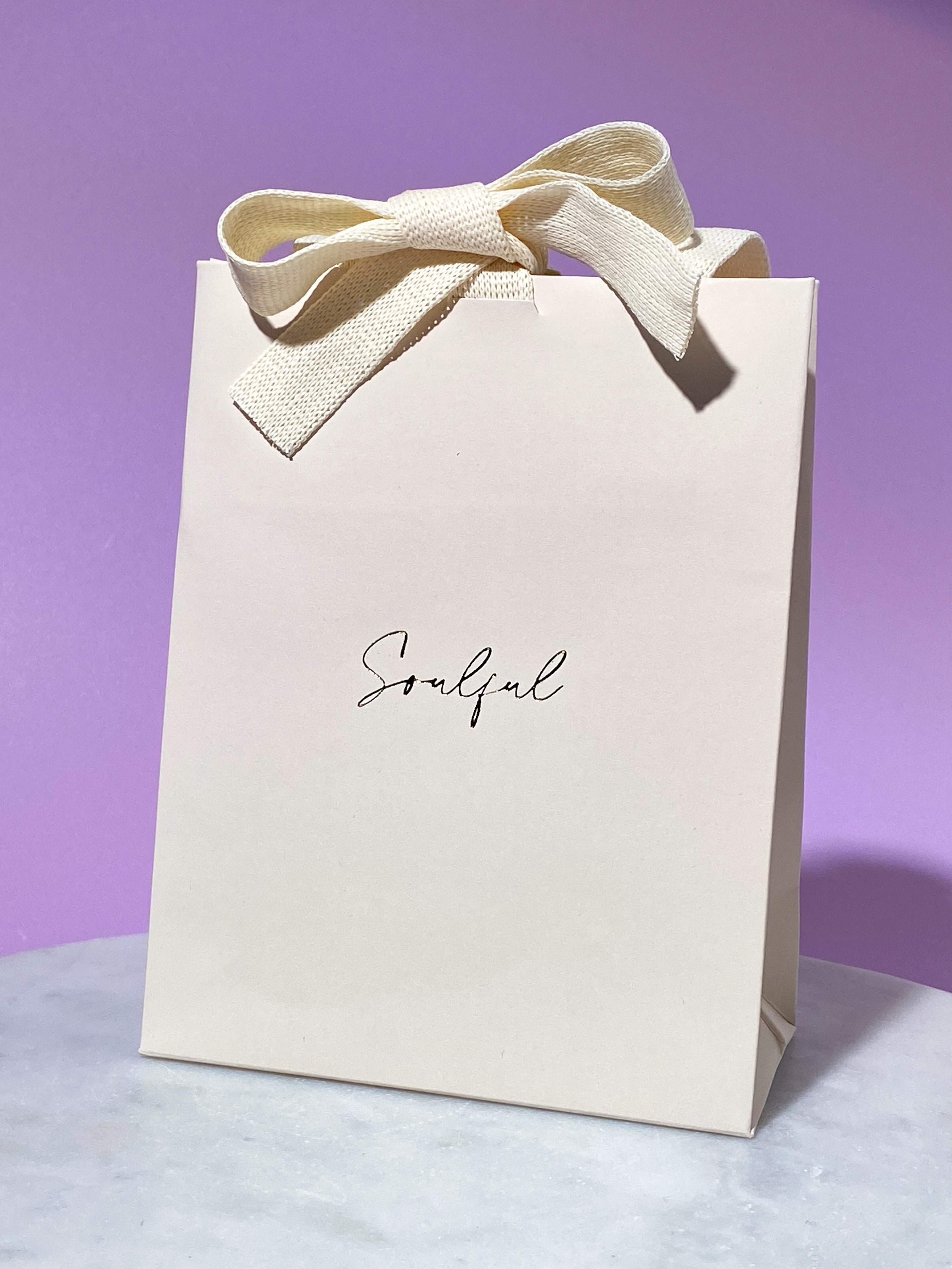 Själfull linneväska