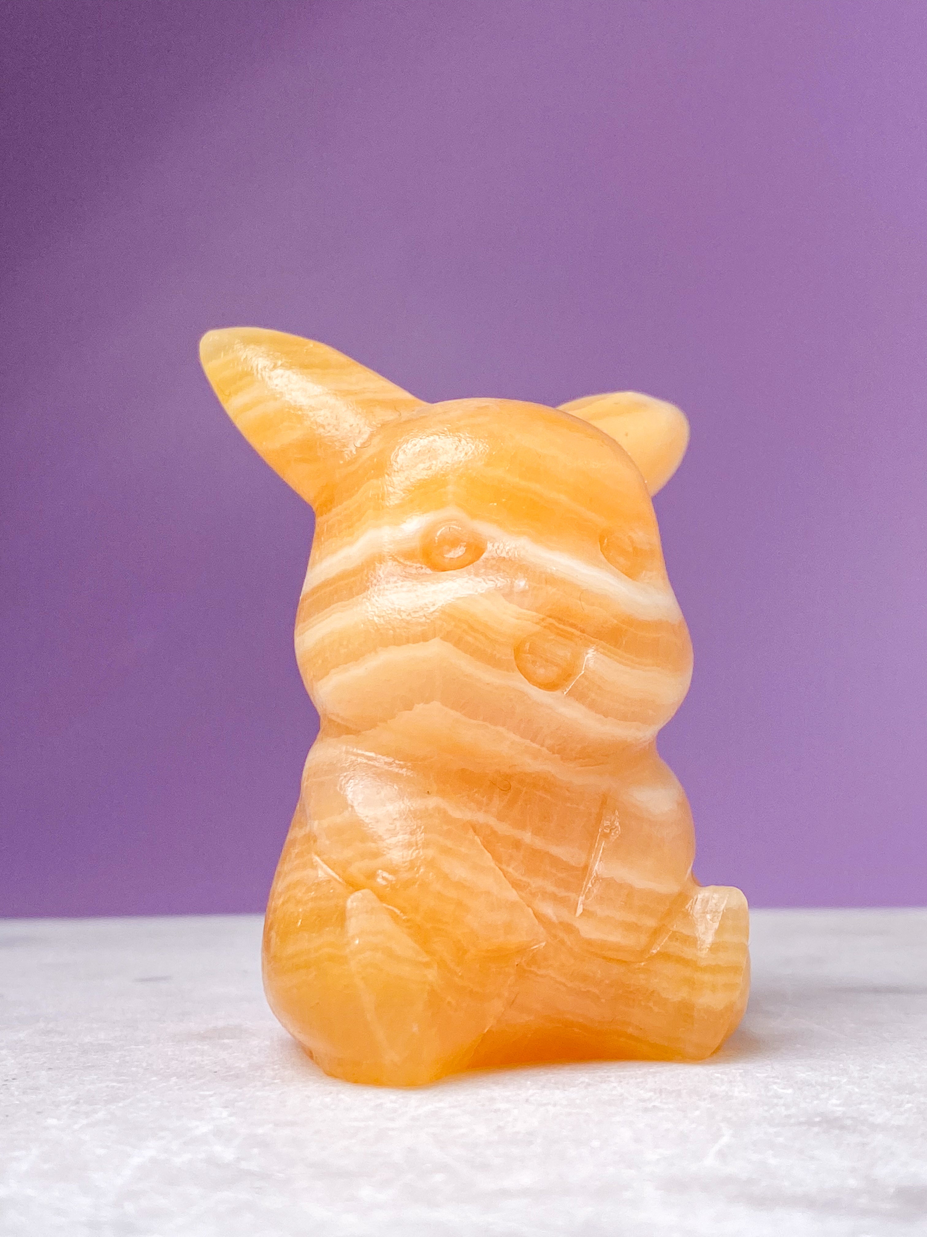 Orange kalcitpumpa med band