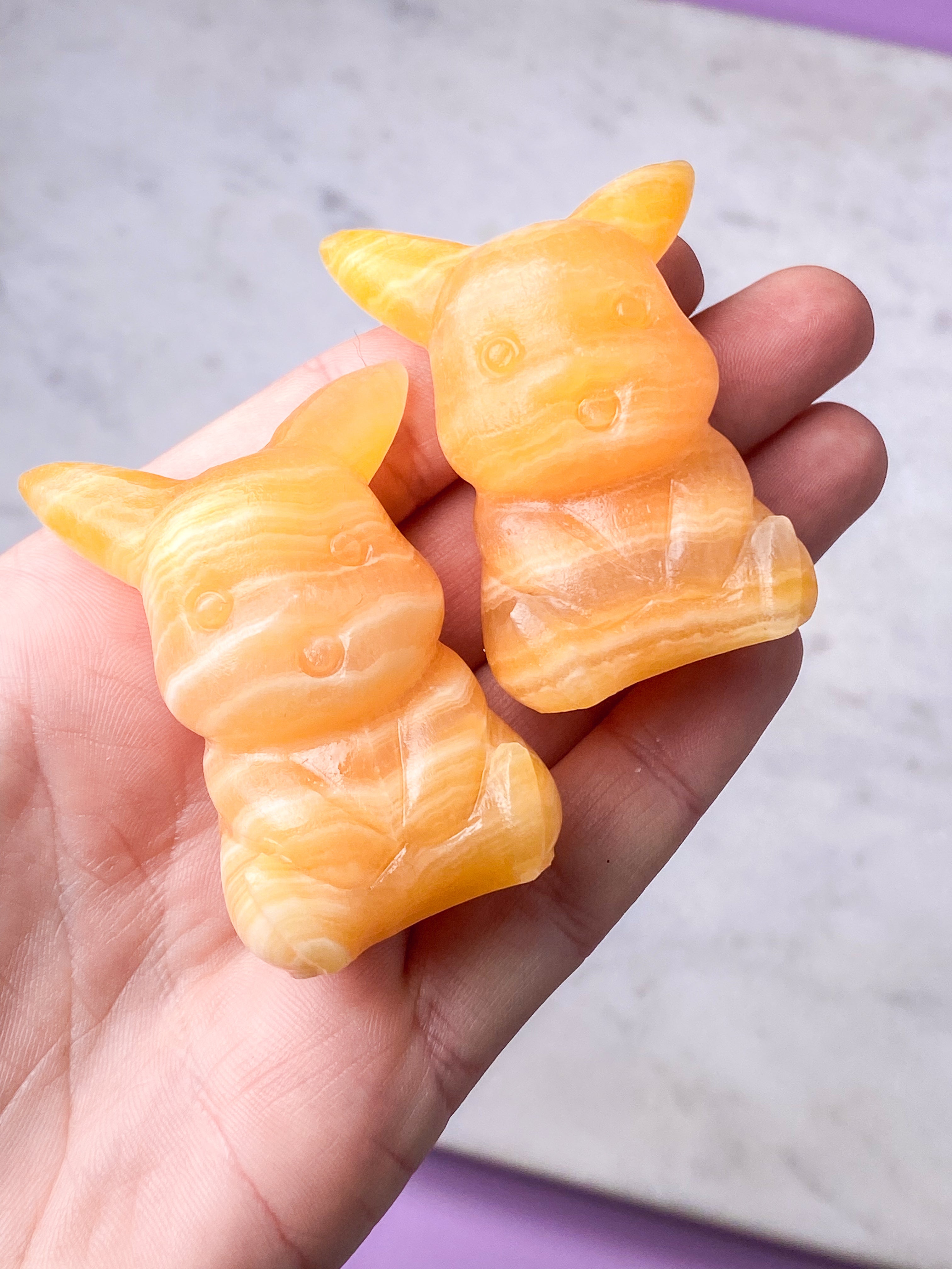 Orange kalcitpumpa med band