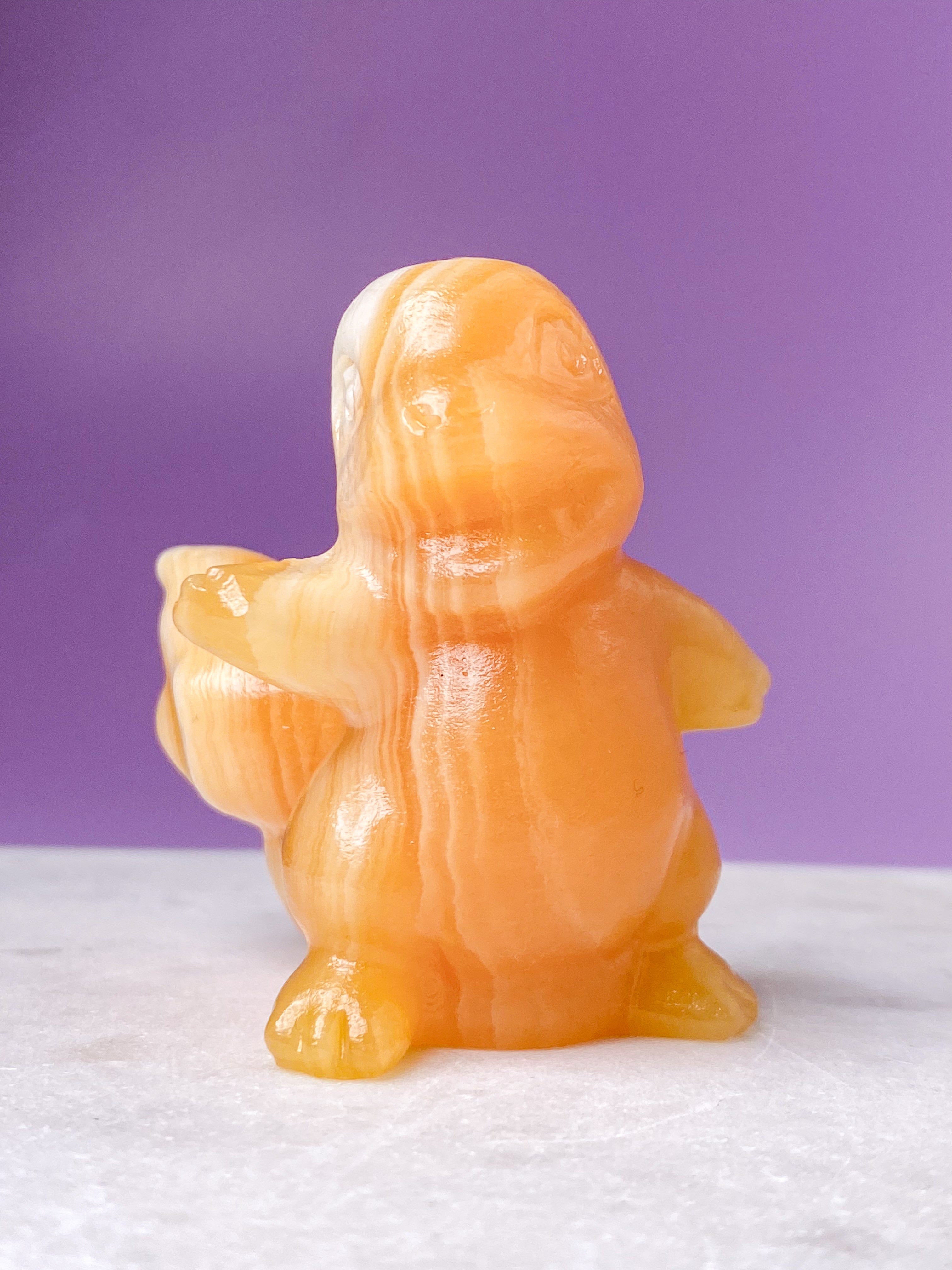 Orange kalcitpumpa med band